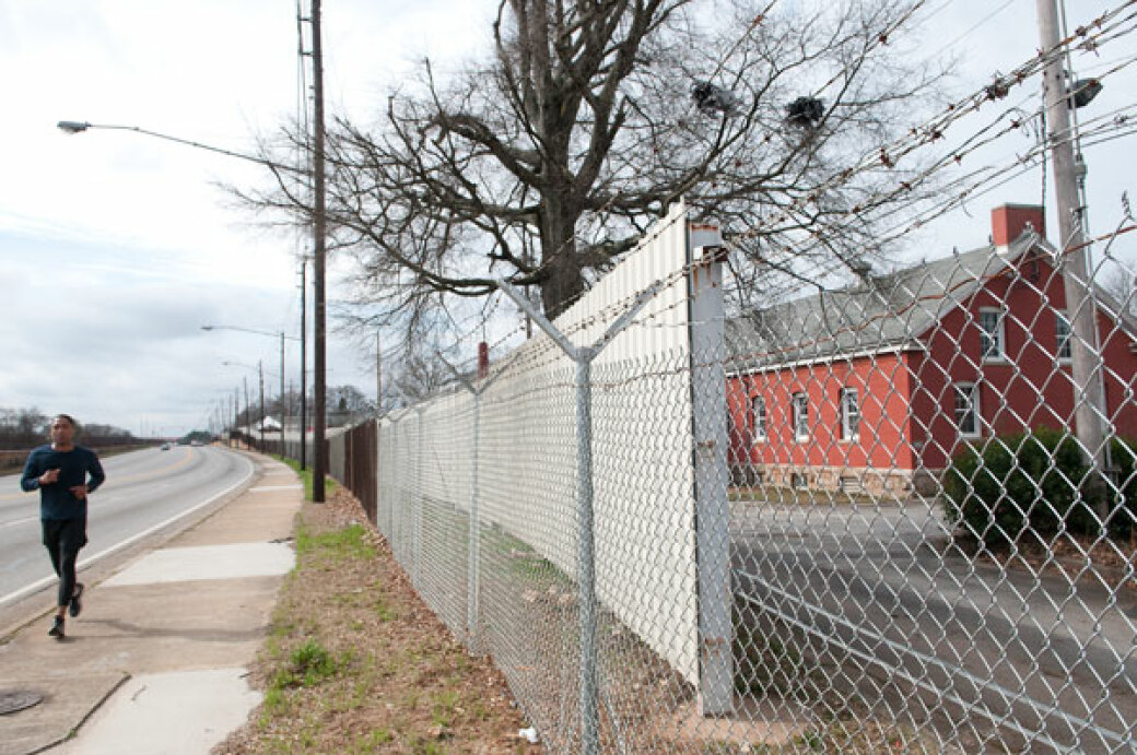WHITE FLAG: Though only portions of Fort McPherson's redevelopment will directly help nearby neighborhoods, some residents insist that the area needs businesses of any kind.