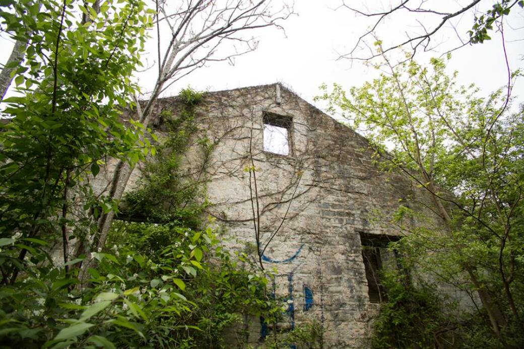 BETTER DAYS: Visible from Key Road, this building is the first sign of just how much remains in disrepair on the property. 