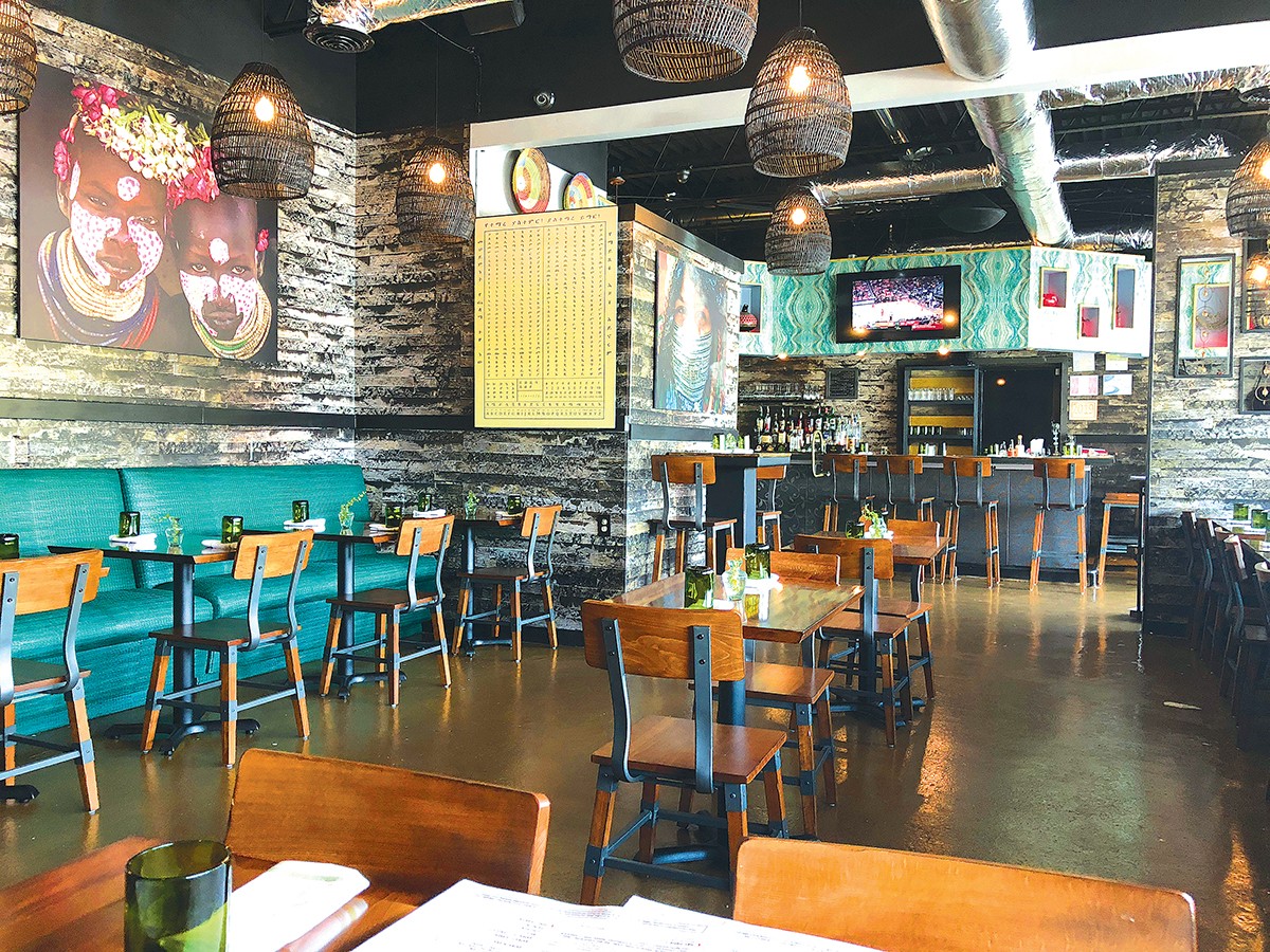 POSITIVELY GLOWING: The dining room of Feedel Bistro. Photo by Cliff Bostock.