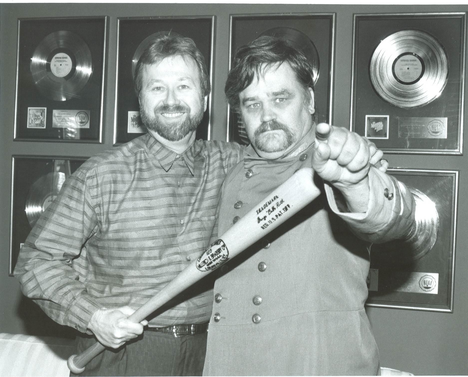 BATMEN: Mark Pucci (left) and Col. Bruce Hampton at the Aquarium Rescue Unit signing (1991). Alan Mayor.