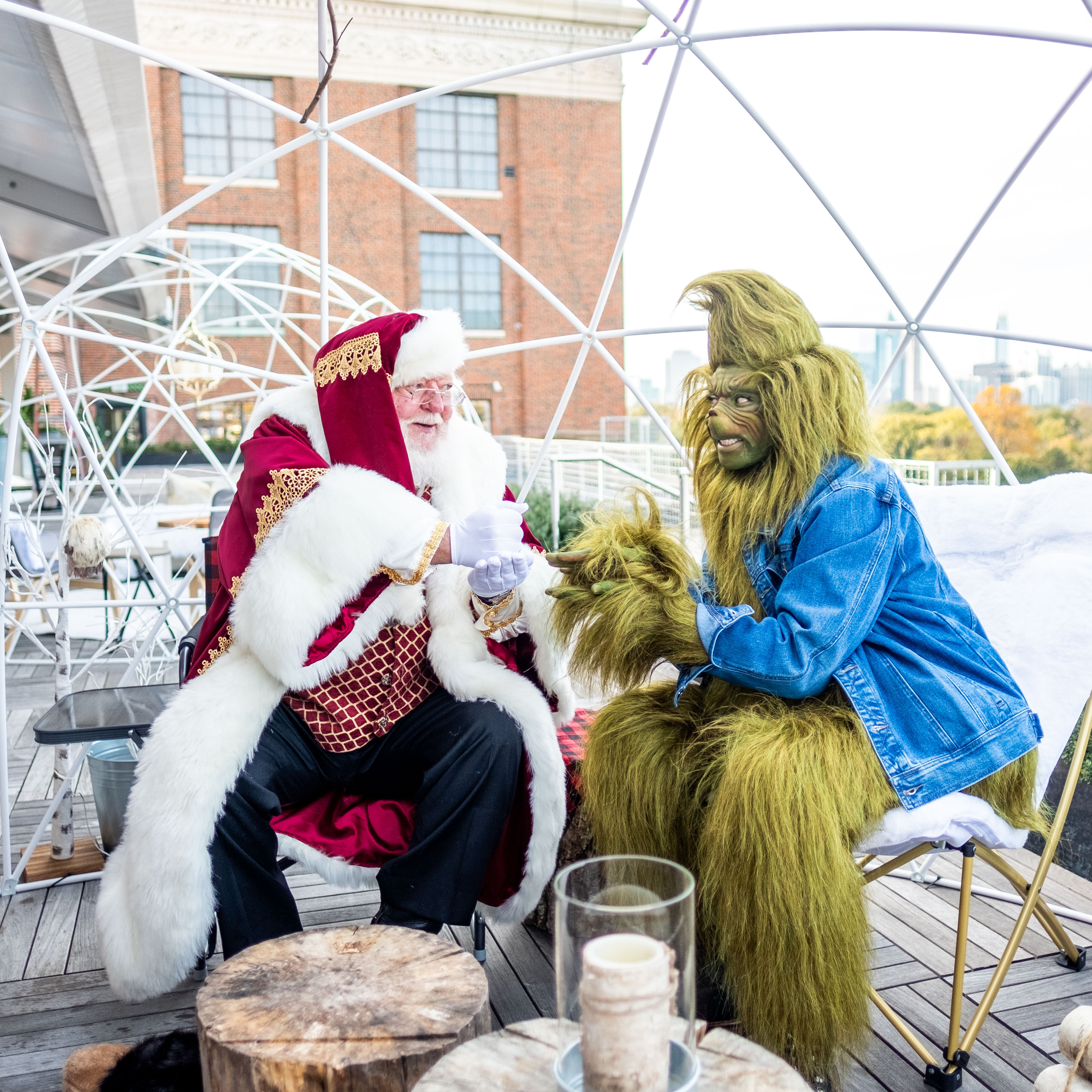 Santa & the Grinch on The Roof Creative Loafing