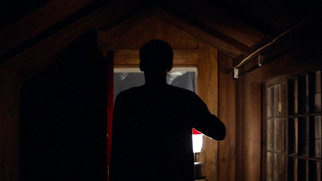 BEHIND THE DOOR: Kelvin Harrison Jr. is afraid of the dark in ''It Comes at Night.'' Courtesy of A24
