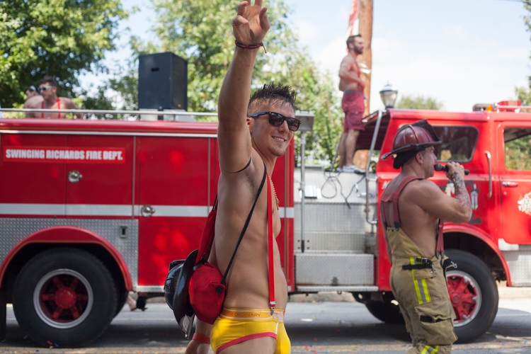The new firefighter uniforms may be too skimpy for fighting actual fires, but the people on 10th Street enjoyed it.