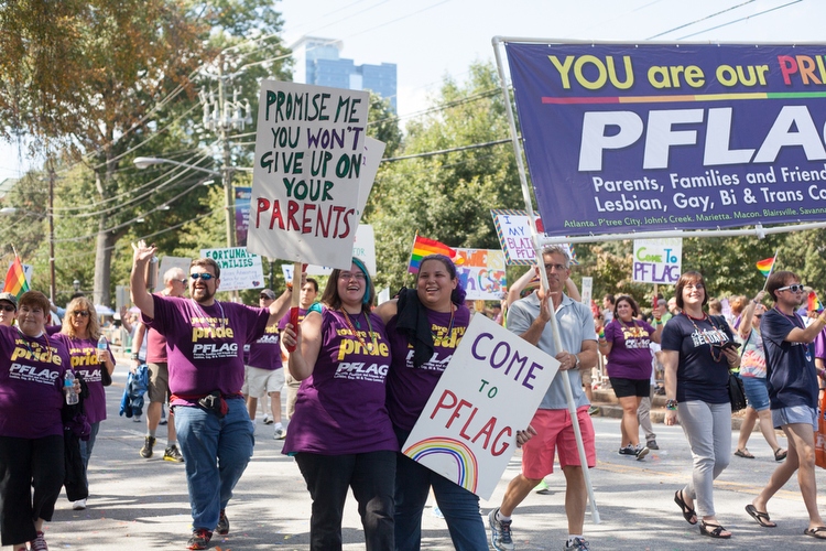 PFLAG's signs showed love and support for their children (and parents).