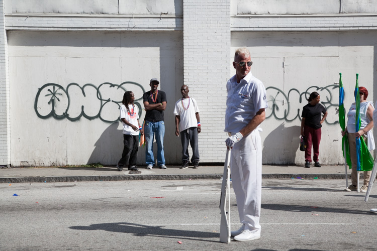 The leader of a drill team prepares for a routine.
