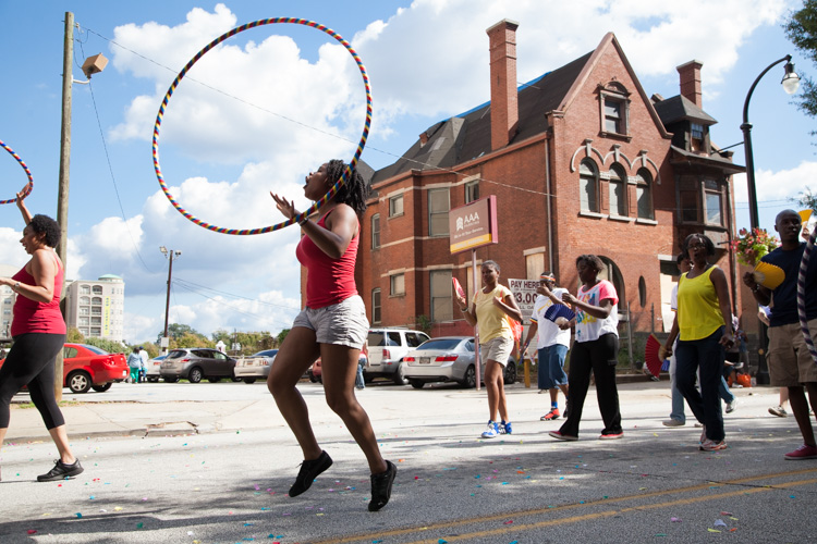 Hula-Hoopers make their way down Peachtree for the Pride Parade.