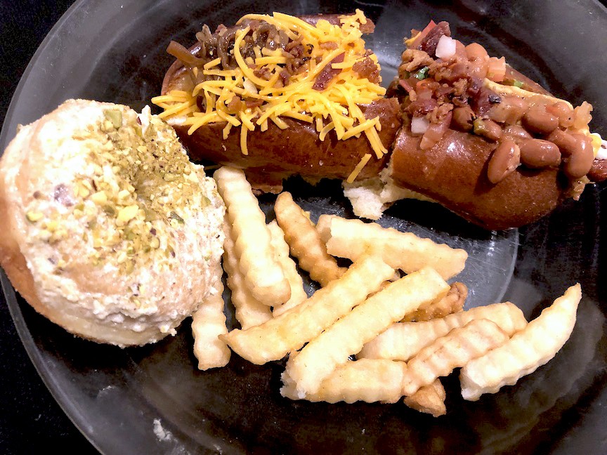 MASH-UP: A pistachio doughnut and fries from Hero and samples of two sausage dogs from Pete's. Photo credit: Cliff Bostock