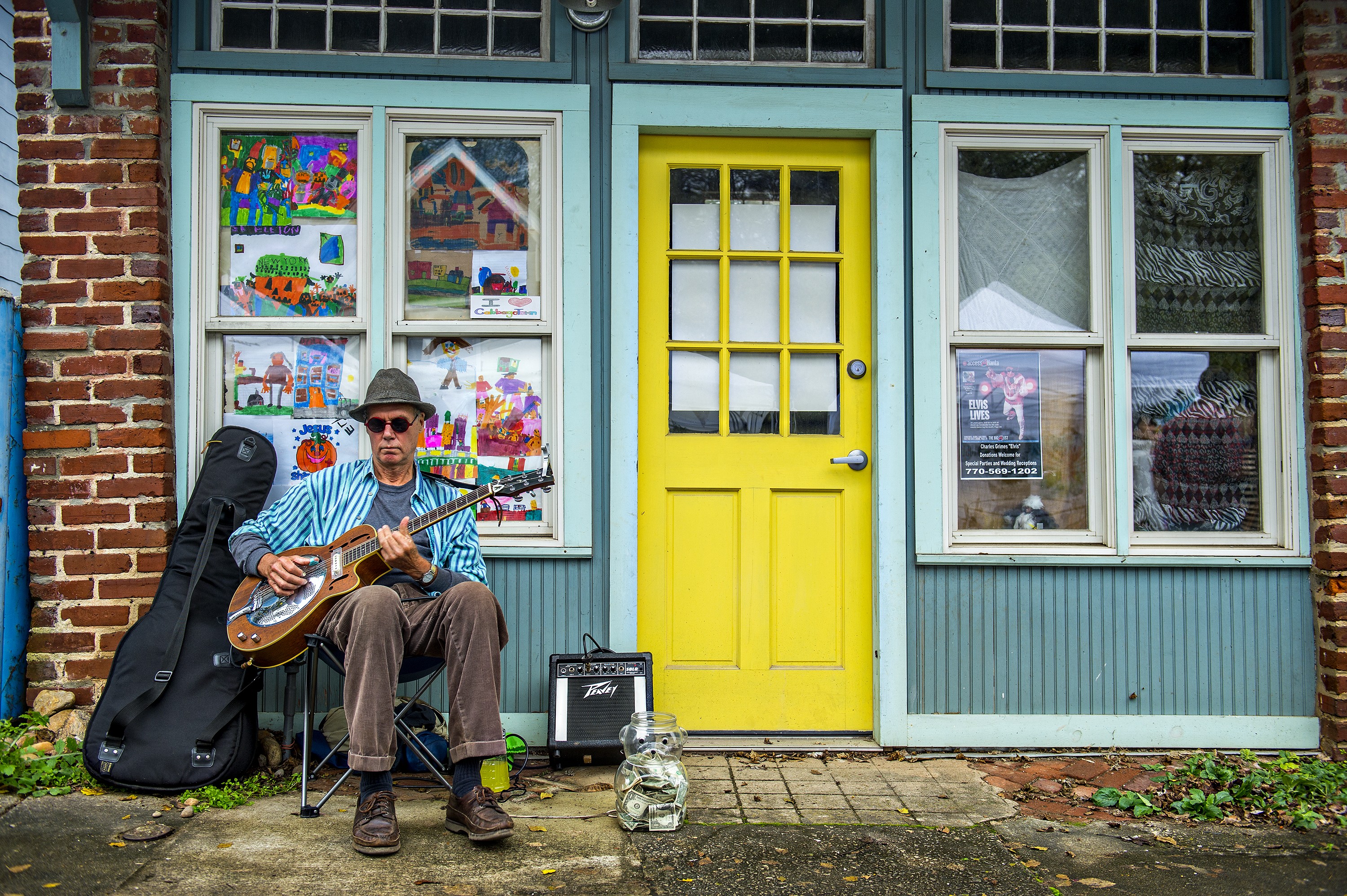 Photo: Jonathan Phillips. Jon Payne plays the guitar. 