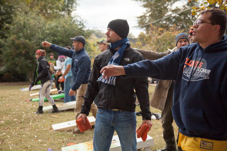 Photo: Kate Lamb. Another way to try to stay warm and enjoy the day was to focus on an old-fashioned game of corn hole.