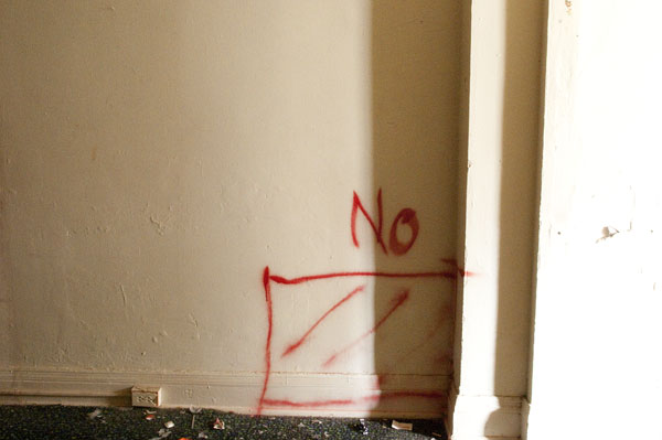 Spraypaint on the wall simply says: "No." Photo by Joeff Davis.