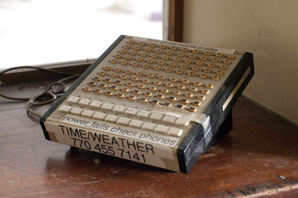 An old telephone on the front desk harkens back to a time when people needed to call a clerk to get the exact time and weather. Photo by Joeff Davis.