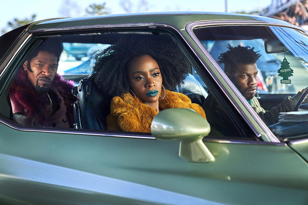 GHETTO SUPERSTARS: Jamie Foxx (from left), Teyonah Parris and John Boyega investigate the mystery of ‘They Cloned Tyrone.’ PHOTO Credit: Courtesy of Parrish Lewis/Netflix